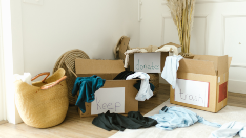 boxes and household items in a pile ready to donate